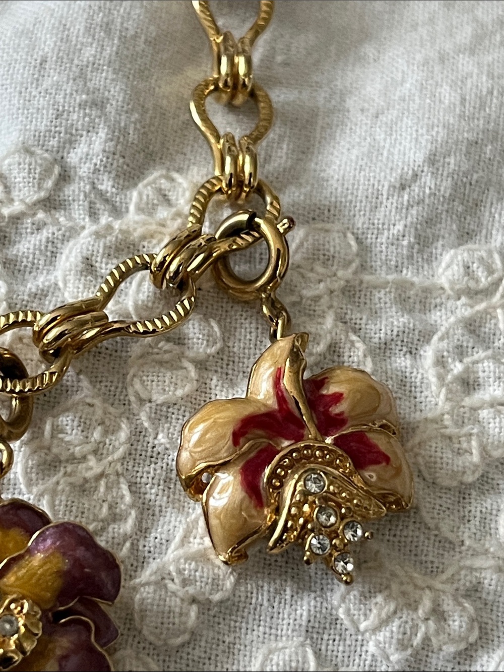 Nolan Miller charm bracelet with orchid charms - Picture 2 of 12